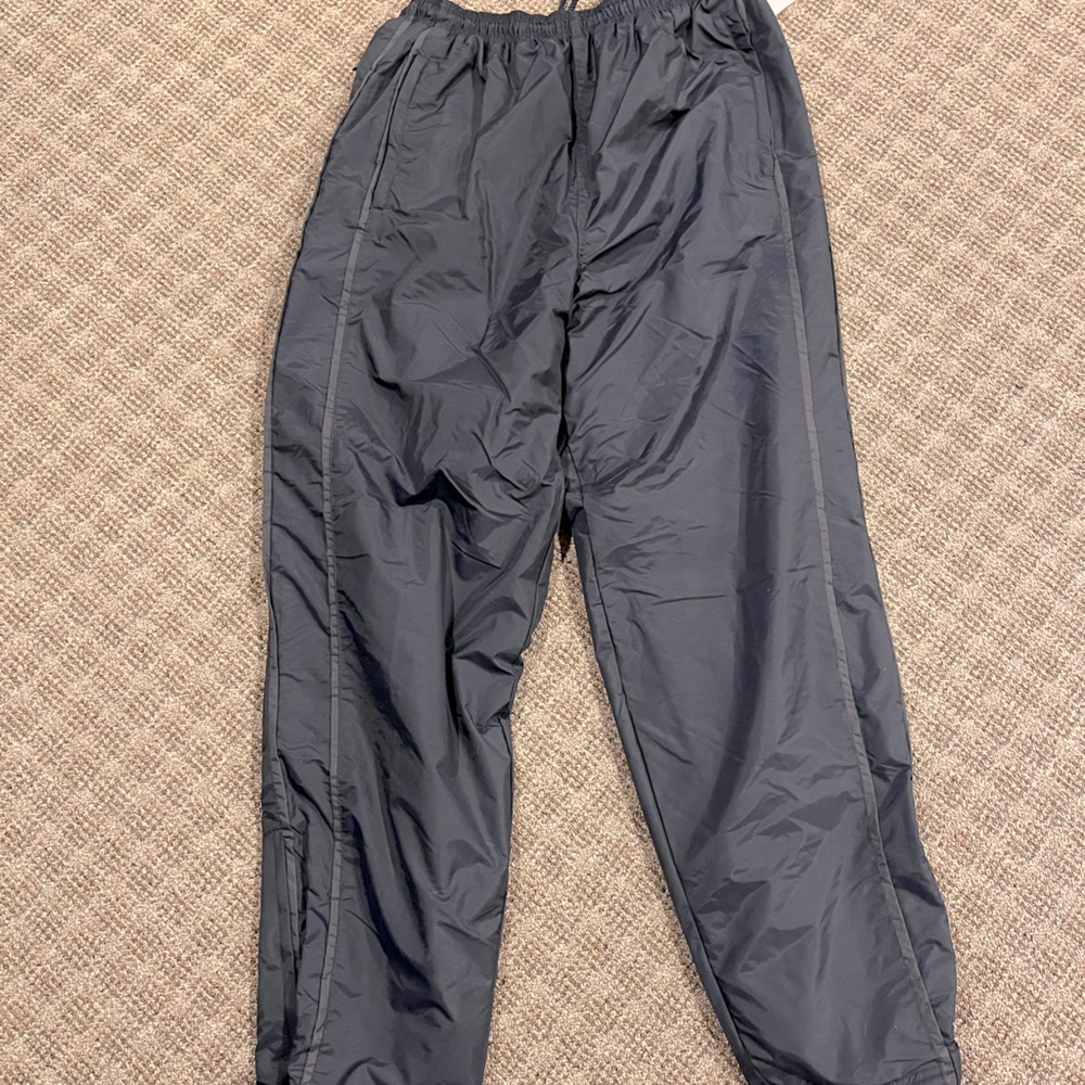 Ski/snow pants. Dark navy wind/water proof fleece lined. Size L